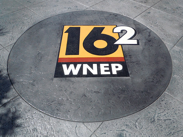 WNEP 16 logo stenciled on concrete