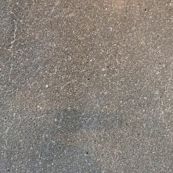Salt and pepper finish on concrete floor