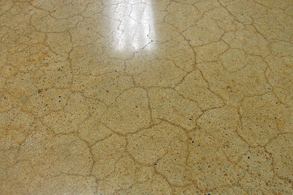  When rapid curing occurs, a concrete slab usually exhibits craze or map cracking. This type of cracking can also occur on hot windy days when the surface cures before the contractor can apply any type of cure.