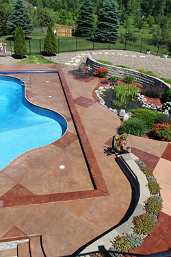 stamped stained concrete pool deck
