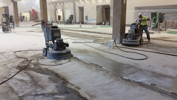 grinding a concrete floor with a polishing machine