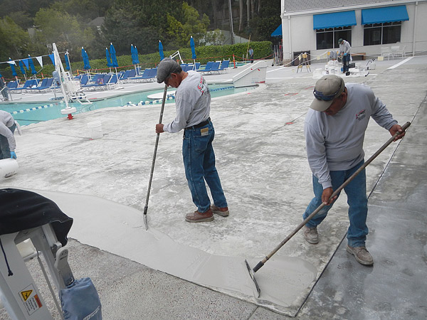cleaning the pool deck area