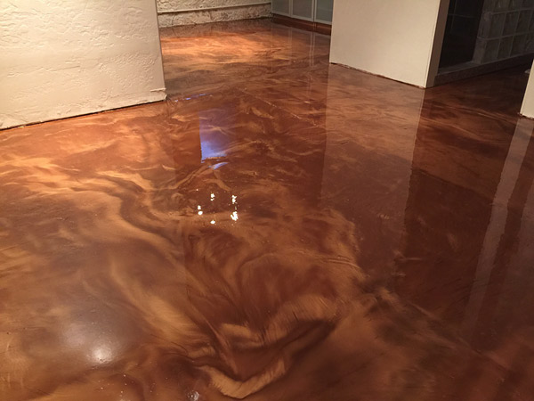orange metallic epoxy floor - If you do not add a solvent, the floor will look like an acid stain with the colored powder flowing naturally throughout the floor depending on gravity and the levelness of the concrete. 