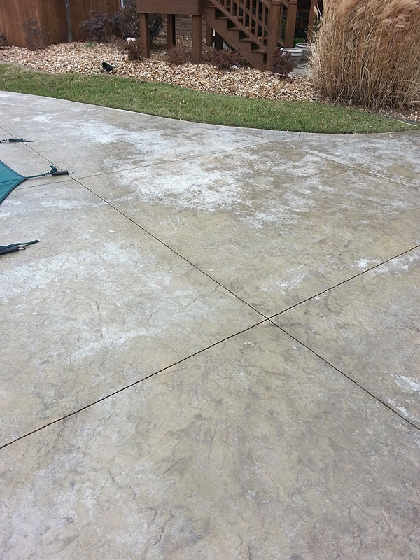 instructions for resealing concrete that is white, flakey, or bubbling sealer.