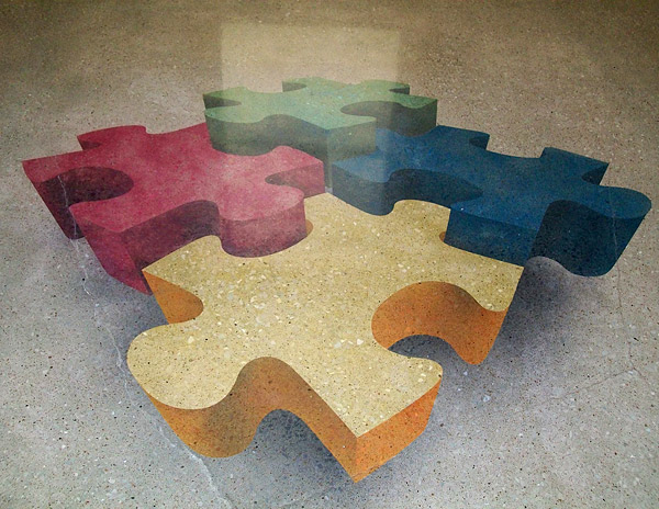 multicolored stenciled concrete puzzle pieces