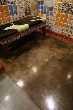 dark brown floor with tiled wall