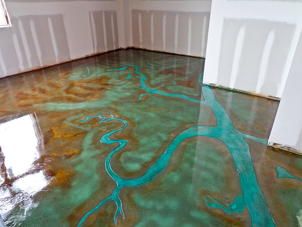 green and brown floor with water like feature
