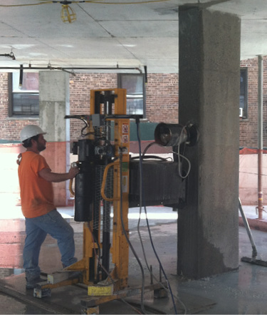 Mark Richardson tweaked six different models to accommodate various polishing tasks. Seen here is one of the machines used in Miami that was also used on a project in New York. Photo courtesy of Vertical Concrete Polishing