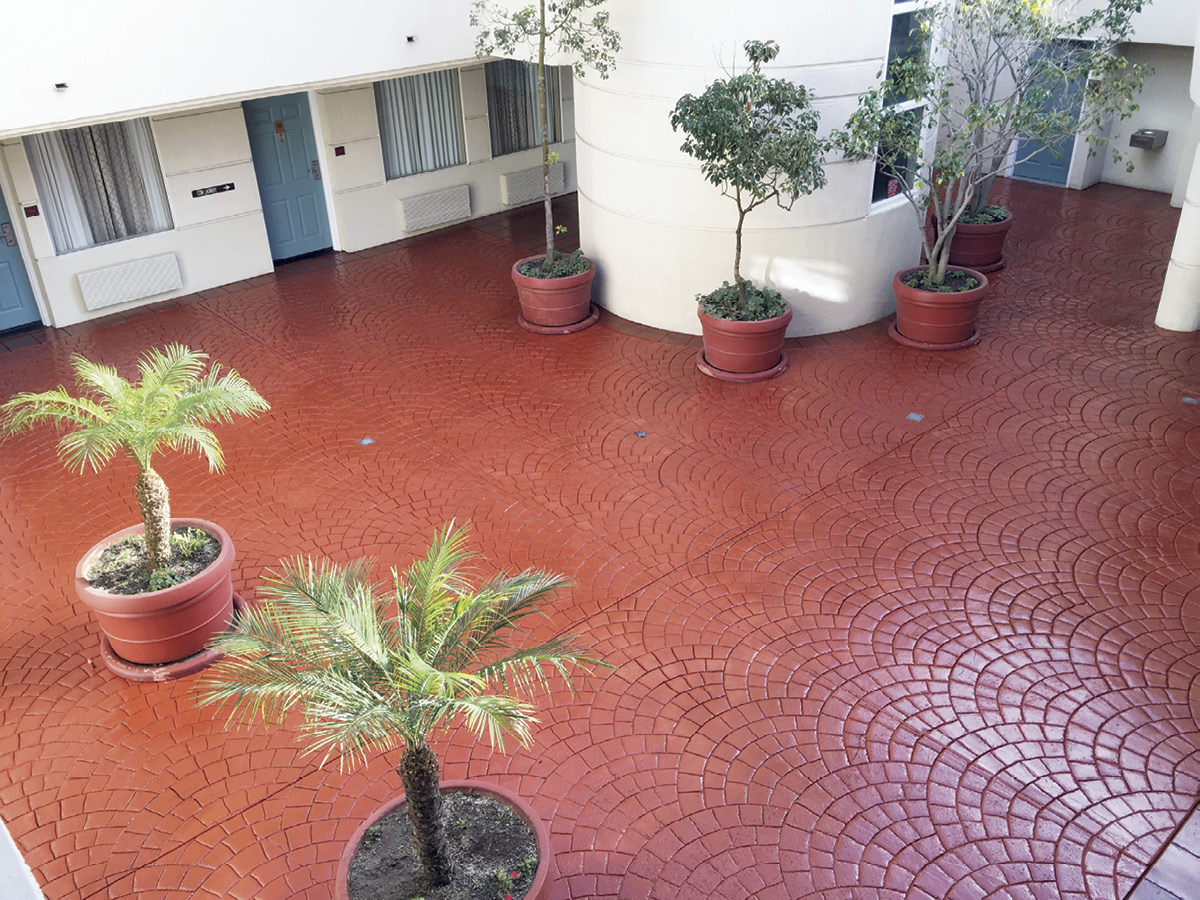 hotel courtyard with red patterned floor