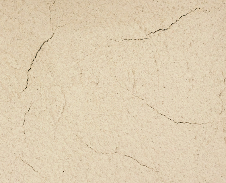 beige floor with shrinkage cracks