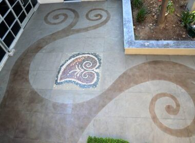 A patio that has been engraved and colored to add life to an otherwise drab space,