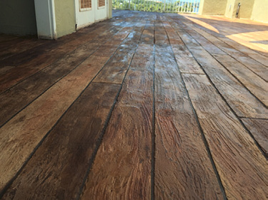 wood plank looking floor made out of concrete