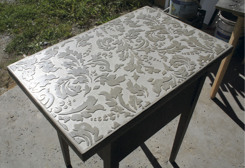leafy stenciled concrete table top