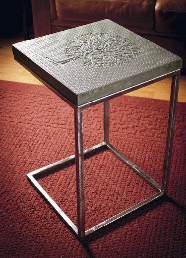 The idea of creating stenciled tables came to him after making bar counters in a class and wondering if he could add a stencil to the bottom of a casing.