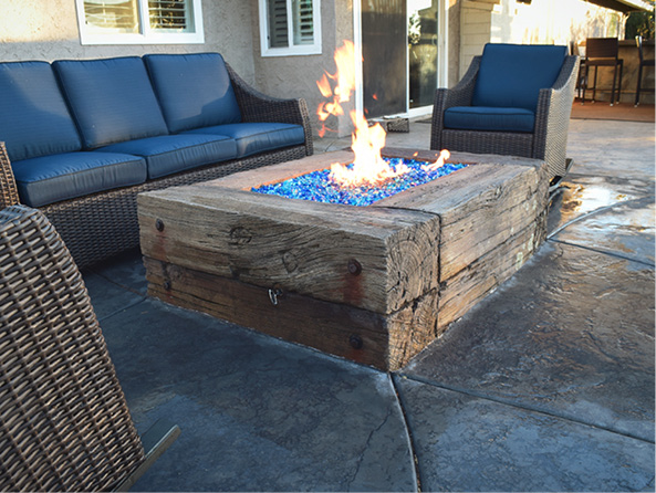 Concrete fire pit that replicates railroad ties, Josh Annis uses hand made tools to create a life like look.