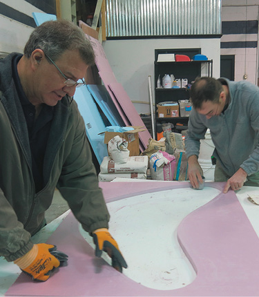 Foam can be used to create a curved table top form. The concrete will be cast inside the hole in the foam.