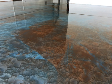 Copper and Teal were used to form this homes garage floor.