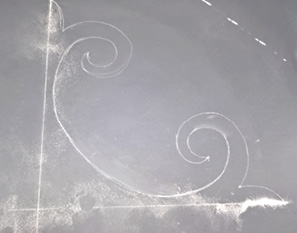 chalk drawing of a design for a concrete medallion.
