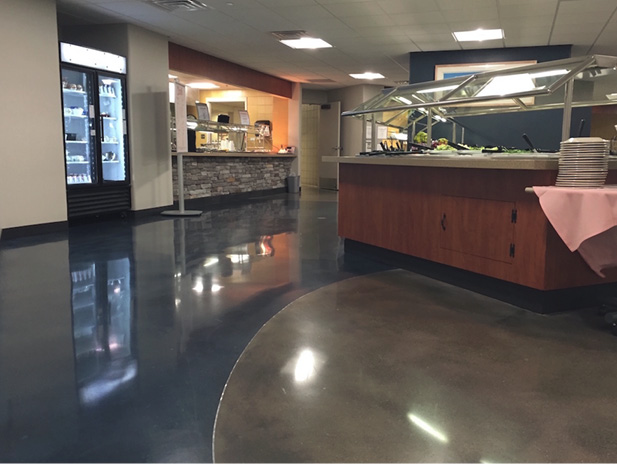 Polished concrete floor with two colors in restaurant buffet.