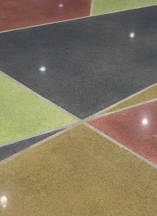 Terrazzo floor system with tight angles.