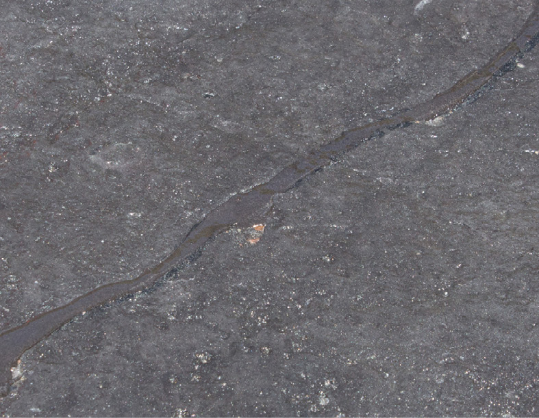 Finished repair of a long crack in concrete