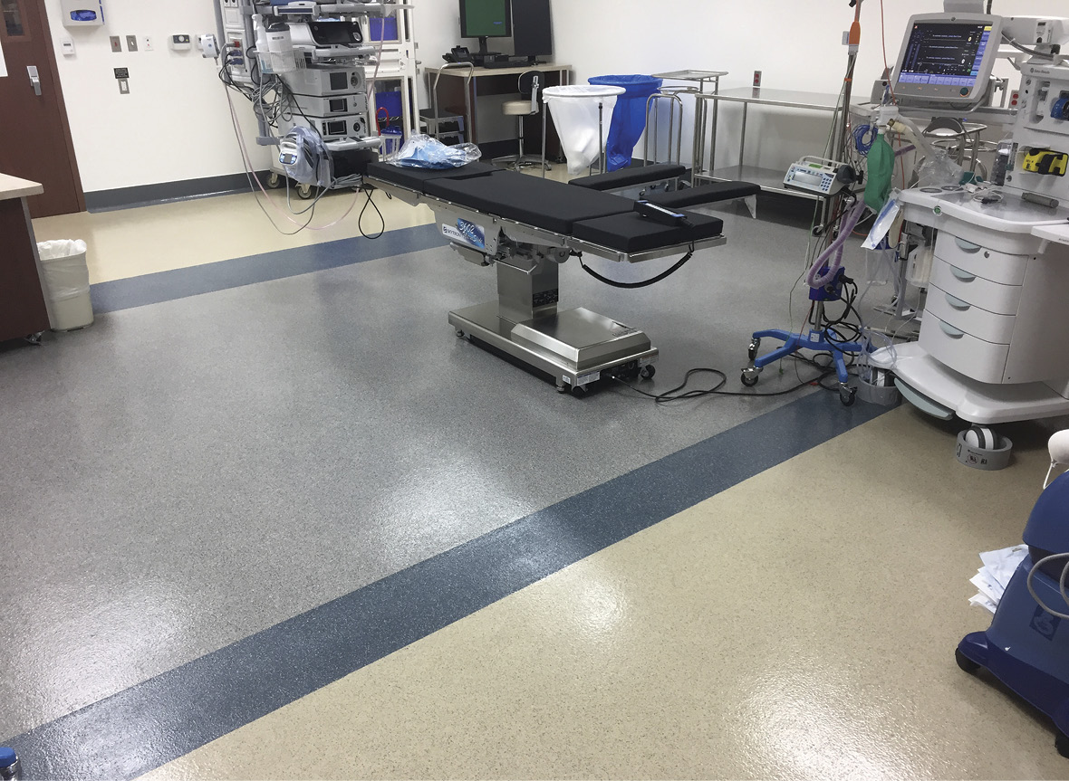 An operating room with a decorative coating installed on the floor.