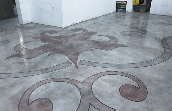 Rick Lobdell and Keefe Duhon placed an overlay system, then cut and stained this concrete floor at Concrete Decor's Decorative Concrete Live at World of Concrete 2018.