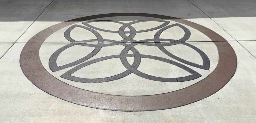Concrete with a mesmerizing circular design.