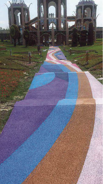 Integrally colored pervious concrete in multiple hues livens up walking paths at the Pujiang Country Park in Shanghai, China. Photo courtesy of Orangestone Construction Technology