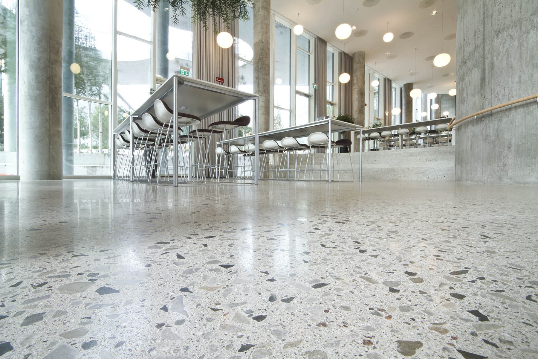 Not all shiny floors are refined polished concrete floors such as this one created with the Husqvarna HiperFloor system. To help the industry deliver more consistent, high-quality floors, task forces are developing guidelines to establish industry-wide specifications for polished floors. Photos courtesy of Husqvarna Construction Products/HTC