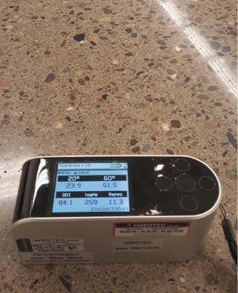 Shown here is a meter that registers a DOI of 84.1, reflecting the clarity of a KickStart finished floor.