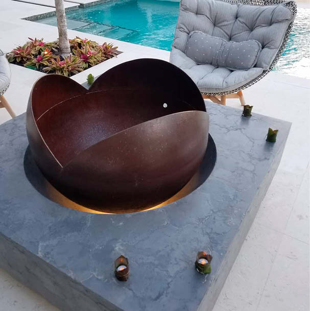 Thats why Josh Thiel of Thiel Studios in Palm Beach, Florida, conjured up this fire bowl as the perfect finishing touch for a Delray Beach homes entertainment area.