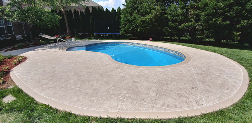 the final look around a pool when you Use Sponges to Color Concrete