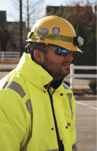 Large job sites usually have a safety officer to monitor the PPE gear workers are wearing and specify what needs to be worn on-site.