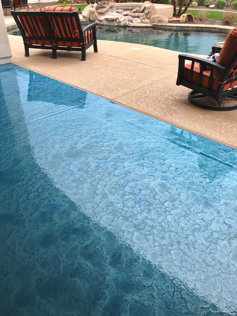 This patio was grinded before an epoxy prime coat with Cohills Tahoe Blue was put down and top coated with 100 percent urethane. The urethane in this install, says installer Jon Kopp, was necessary. Epoxy wont protect a surface from the suns UV rays like a urethane does, he says.