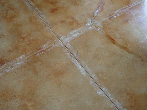 Trapped moisture in saw cuts on a cold slab create moisture haze and efflorescence.