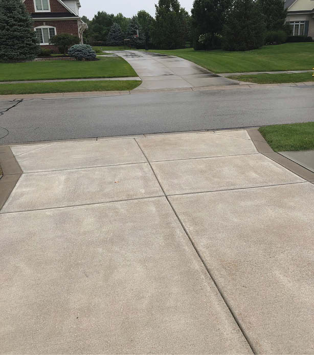 Sealed concrete driveway.