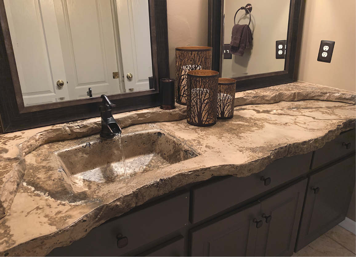 One of the allures of crafting sinks and surrounding countertops out of concrete are the materials chameleon-like characteristics that can mimic everything from natural and polished stone to draped fabric and tiered surfaces.