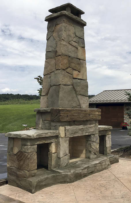 Vertical concrete in the backyard is gaining ground in residential areas across the country and proving to be a popular treatment for outdoor kitchens and fireplaces.