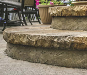 Butterfield's one-piece cantilevered cut stone edge and textured riser lets you create realistic-looking stone steps.