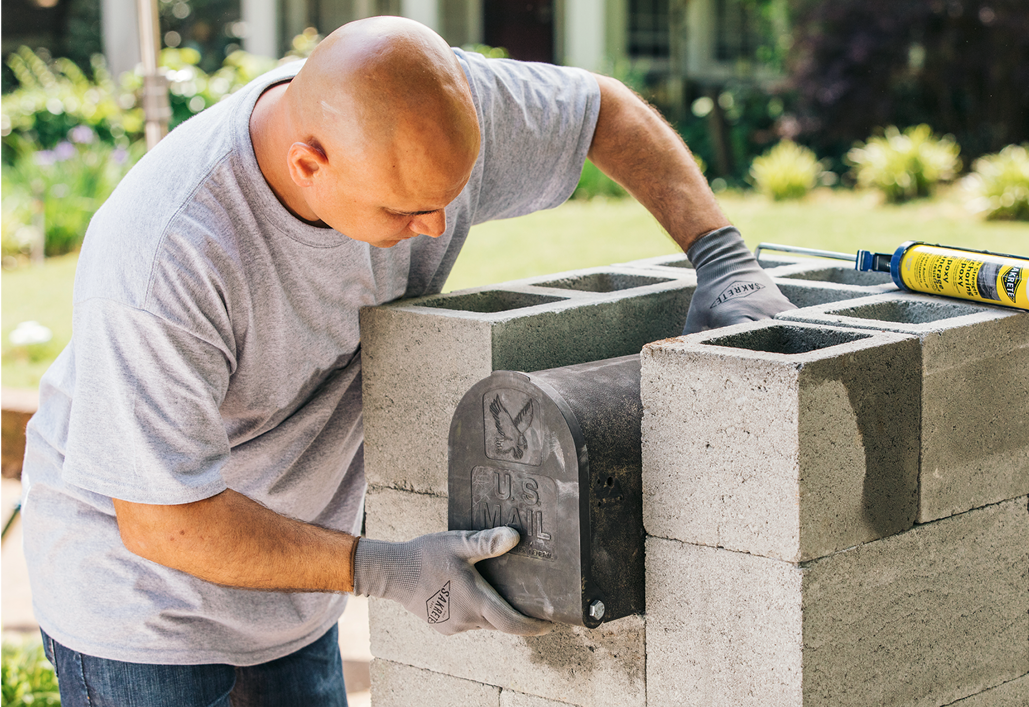Carefully measure the area to ensure there's enough room to set the finishing blocks on top of the mailbox. You may need to notch a section to accommodate the mailbox height.