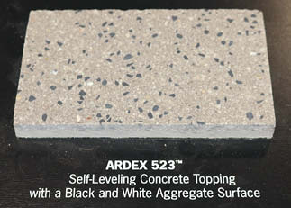 Looking a whole lot like terrazzo, Ardex K523 is a blend of Portland cement, hydraulics cement and black-and-white aggregate thats used to resurface indoor floors.
