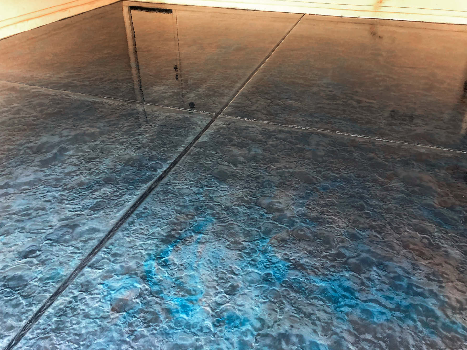Blue and gray metallic epoxy floor