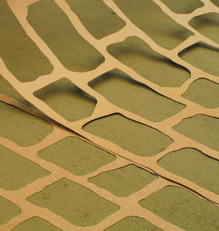 Applying the concrete stencil is a delicate and detailed oriented task,