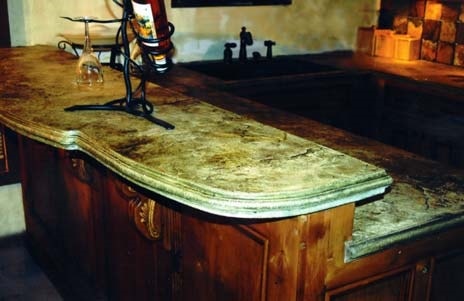 Rustic stained and sealed concrete countertops for that one of a kind look in your kitchen.