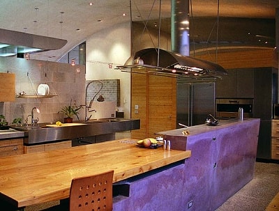 Tea house in Berkeley, California, has a large modern purple concrete countertop.
