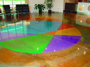 Bright colors on a concrete floor are achieved with acrylic stains