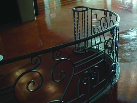 An ornate bannister ties the entire concrete project together.