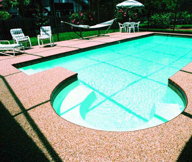 Putting an epoxy pebble system around a pool deck is a great idea for water issues