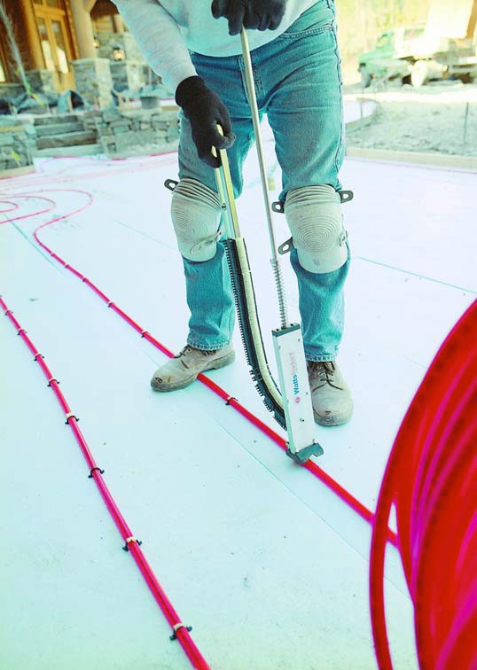 Attaching the radiant heat coils requires a special tool and staple